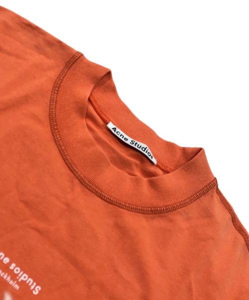 Acne studios（アクネ ストゥディオス）Acne studios (アクネ ストゥディオス) リバースロゴプリントTシャツ オレンジ サイズ:Sの古着・服飾アイテム