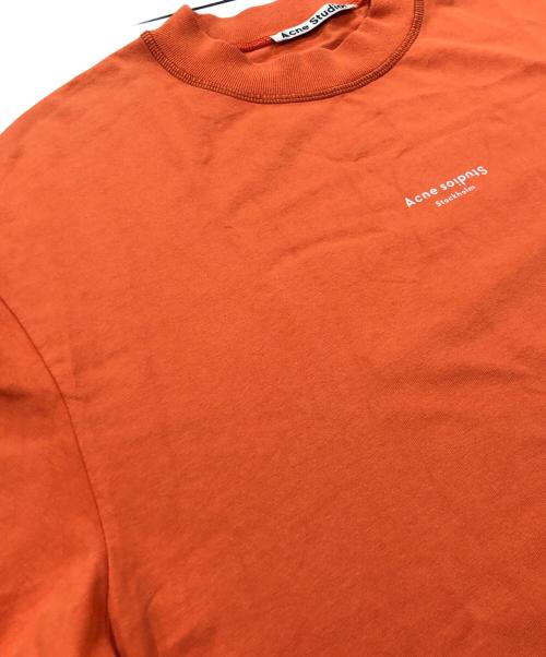 Acne studios（アクネ ストゥディオス）Acne studios (アクネ ストゥディオス) リバースロゴプリントTシャツ オレンジ サイズ:Sの古着・服飾アイテム
