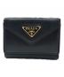 PRADA（プラダ）の古着「サフィアーノ-コンパクトウォレット」｜ブラック