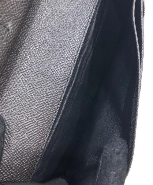 TOD'S（トッズ）TOD'S (トッズ) ラウンドジップウォレット ブラウンの古着・服飾アイテム