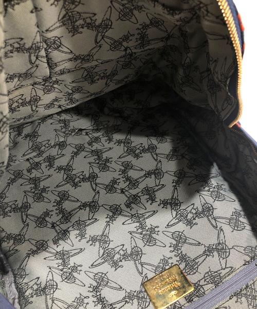 Vivienne Westwood（ヴィヴィアンウエストウッド）Vivienne Westwood (ヴィヴィアンウエストウッド) 星と宇宙船-リュックサック エンジ×ネイビーの古着・服飾アイテム