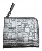 COMME des GARCONSコムデギャルソン）の古着「EMBOSSED LOGOTYPE」｜シルバー
