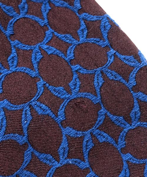 VIVIENNE TAM（ヴィヴィアンタム）VIVIENNE TAM (ヴィヴィアンタム) モノグラム刺繍ジップコート ブラウン×ネイビーの古着・服飾アイテム