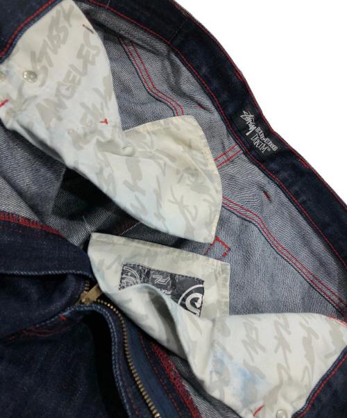 stussy（ステューシー）stussy (ステューシー) FUTURA LABORATORIES (フューチュラ ラボラトリーズ) ROUGH and RUGGED デニムパンツ インディゴ サイズ:91cm　W36の古着・服飾アイテム