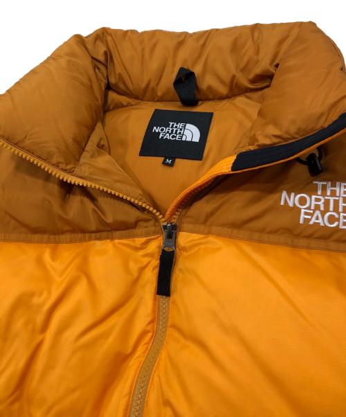 THE NORTH FACE（ザ ノース フェイス）THE NORTH FACE (ザ ノース フェイス) NUPTSE JACKET オレンジ サイズ:Mの古着・服飾アイテム