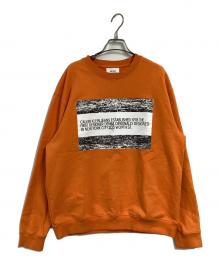 Calvin Klein Jeans（カルバンクラインジーンズ）の古着「プリントスウェット」｜オレンジ