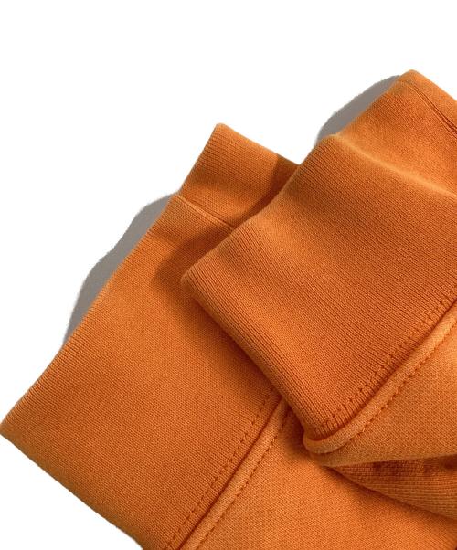 Calvin Klein Jeans（カルバンクラインジーンズ）Calvin Klein Jeans (カルバンクラインジーンズ) プリントスウェット オレンジ サイズ:Lの古着・服飾アイテム