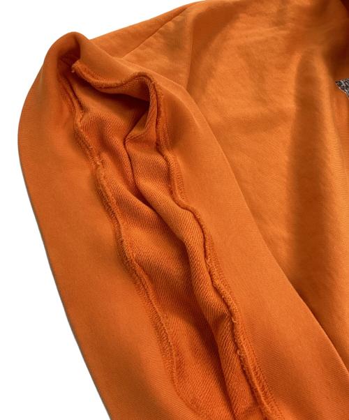 Calvin Klein Jeans（カルバンクラインジーンズ）Calvin Klein Jeans (カルバンクラインジーンズ) プリントスウェット オレンジ サイズ:Lの古着・服飾アイテム