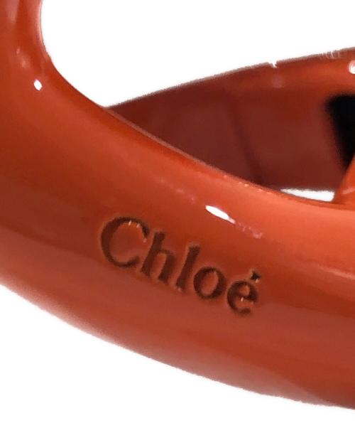 Chloe（クロエ）Chloe (クロエ) キスブレスレット オレンジの古着・服飾アイテム
