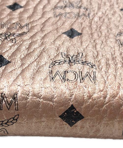 MCM（エムシーエム）MCM (エムシーエム) ラウンドジップウォレット ピンクの古着・服飾アイテム