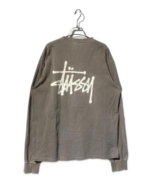 stussy（ステューシー）stussy (ステューシー) 両面プリントロングスリーブカットソー/クルーネックカットソー ブラウン サイズ:Lの古着・服飾アイテム