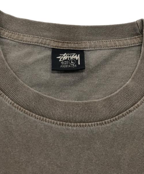 stussy（ステューシー）stussy (ステューシー) 両面プリントロングスリーブカットソー/クルーネックカットソー ブラウン サイズ:Lの古着・服飾アイテム
