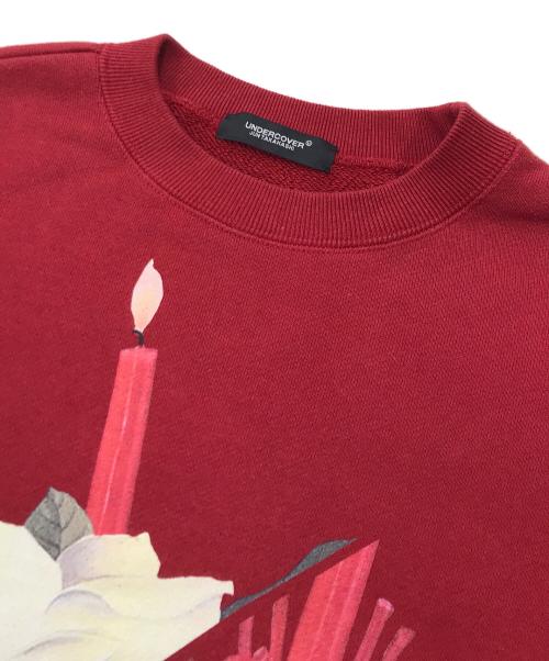 UNDERCOVER（アンダーカバー）UNDERCOVER (アンダーカバー) ケーキプリントクルーネックスウェットシャツ/柄スウェット レッド サイズ:１の古着・服飾アイテム
