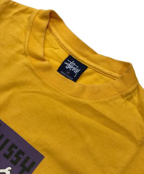 stussy（ステューシー）stussy (ステューシー) スカルプリントTシャツ/クルーネックTシャツ イエロー サイズ:Mの古着・服飾アイテム
