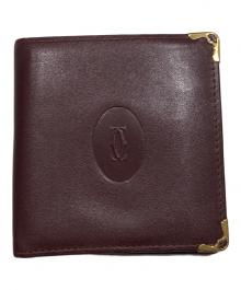 Cartier（カルティエ）の古着「マスト折り財布」｜レッド