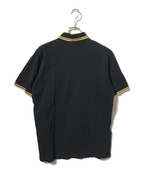 FRED PERRY（フレッドペリー）FRED PERRY (フレッドペリー) ポロシャツ ブラック×ゴールド サイズ:42の古着・服飾アイテム