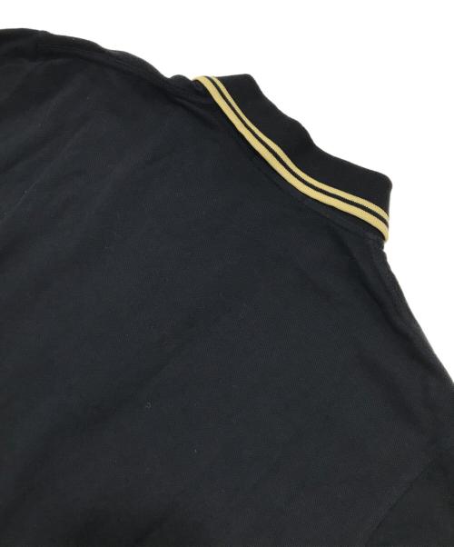 FRED PERRY（フレッドペリー）FRED PERRY (フレッドペリー) ポロシャツ ブラック×ゴールド サイズ:42の古着・服飾アイテム