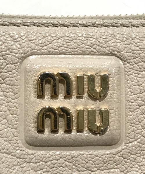 MIU MIU（ミュウミュウ）MIU MIU (ミュウミュウ) マドラス フラグメントケース ピンクの古着・服飾アイテム