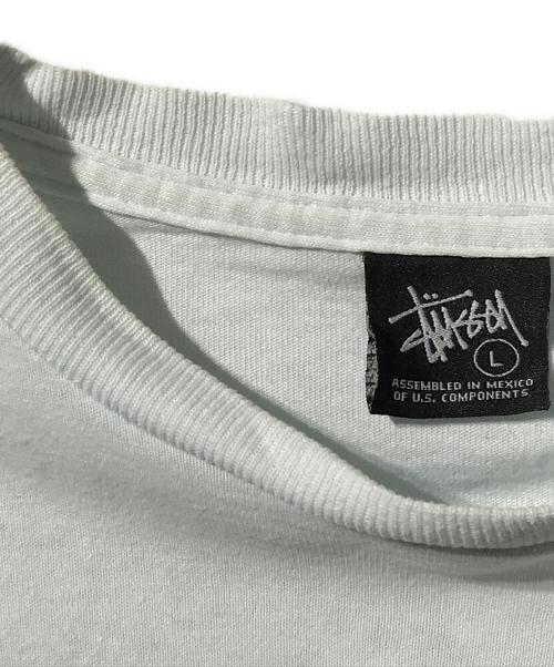 stussy（ステューシー）stussy (ステューシー) 音符スカルSロゴプリントTシャツ スカイブルー サイズ:Lの古着・服飾アイテム
