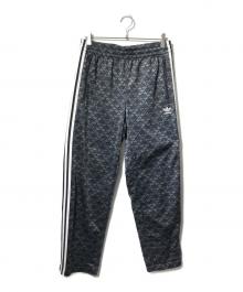 adidas（アディダス）の古着「ファイヤーバード クラシック モノトラックパンツ」｜グレー