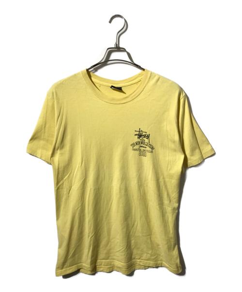 stussy（ステューシー）stussy (ステューシー) ワールドツアープリントTシャツ イエロー サイズ:Mの古着・服飾アイテム