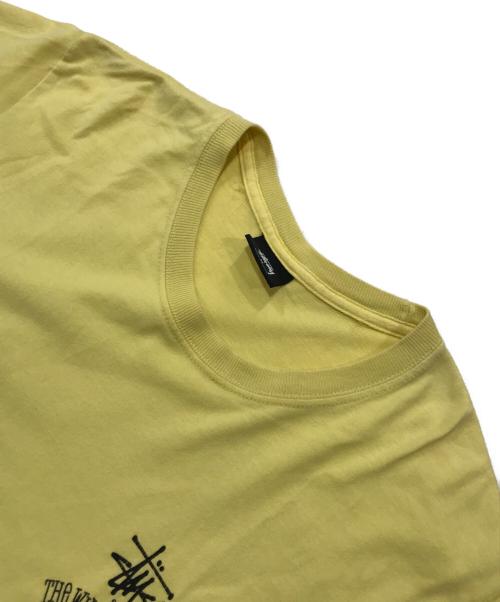 stussy（ステューシー）stussy (ステューシー) ワールドツアープリントTシャツ イエロー サイズ:Mの古着・服飾アイテム
