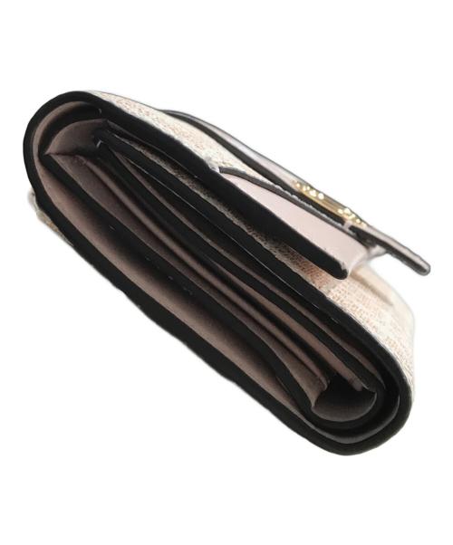 MICHAEL KORS（マイケルコース）MICHAEL KORS (マイケルコース) モノグラム2つ折り財布 ピンクの古着・服飾アイテム