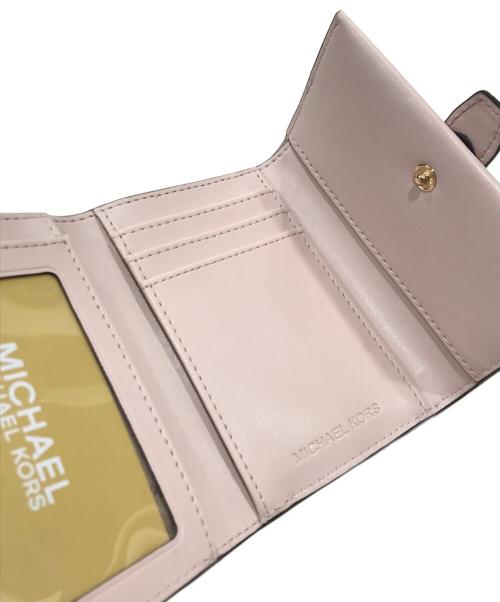 MICHAEL KORS（マイケルコース）MICHAEL KORS (マイケルコース) モノグラム2つ折り財布 ピンクの古着・服飾アイテム