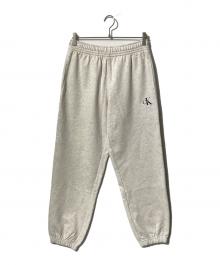 Calvin Klein（カルバンクライン）の古着「モノグラムロゴフレンチテリージョガーパンツ」｜ホワイト