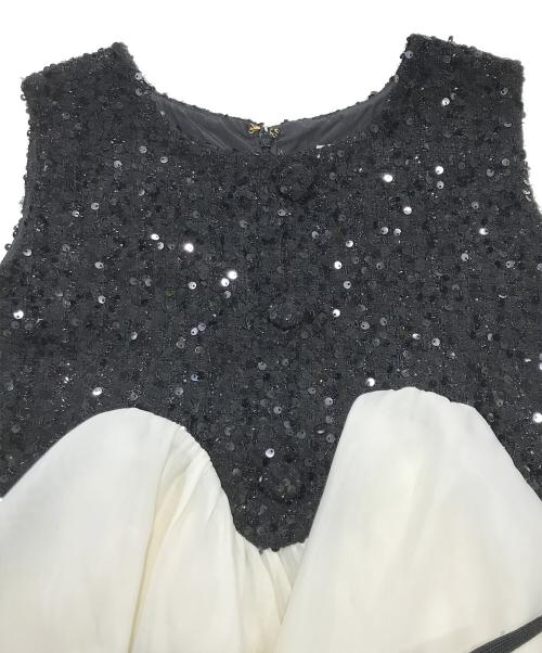 polaura（ポロ―ラ）polaura (ポロ―ラ) スパークル ツイード ペプラムトップス ホワイト×ブラック サイズ:Fの古着・服飾アイテム
