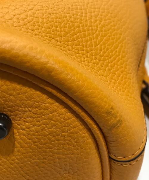 COACH（コーチ）COACH (コーチ) Lora Bucket Bag With Whipstitch Detail/2wayバッグ オレンジの古着・服飾アイテム