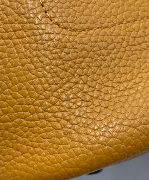 COACH（コーチ）COACH (コーチ) Lora Bucket Bag With Whipstitch Detail/2wayバッグ オレンジの古着・服飾アイテム