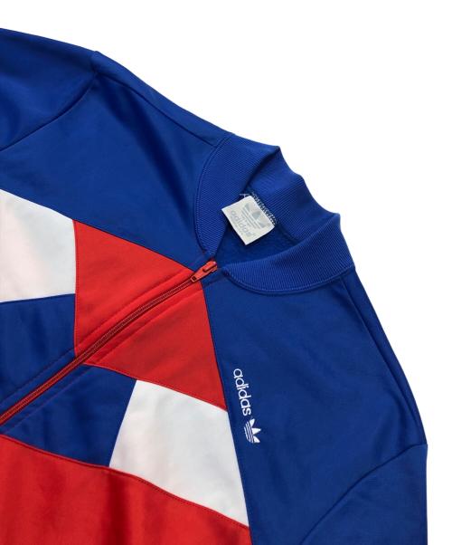 adidas（アディダス）adidas (アディダス) トラックジャケット/ジャージ レッド×ブルー サイズ:Mの古着・服飾アイテム