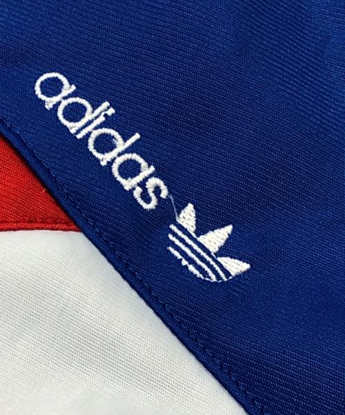 adidas（アディダス）adidas (アディダス) トラックジャケット/ジャージ レッド×ブルー サイズ:Mの古着・服飾アイテム