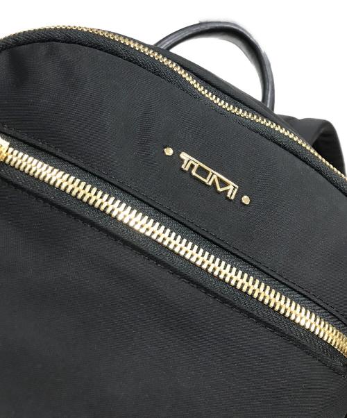 TUMI（トゥミ）TUMI (トゥミ) リュック ブラック×ゴールドの古着・服飾アイテム