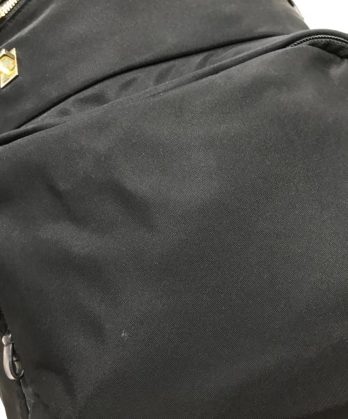 TUMI（トゥミ）TUMI (トゥミ) リュック ブラック×ゴールドの古着・服飾アイテム