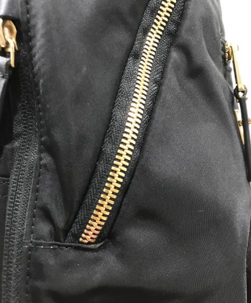 TUMI（トゥミ）TUMI (トゥミ) リュック ブラック×ゴールドの古着・服飾アイテム