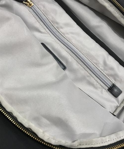 TUMI（トゥミ）TUMI (トゥミ) リュック ブラック×ゴールドの古着・服飾アイテム
