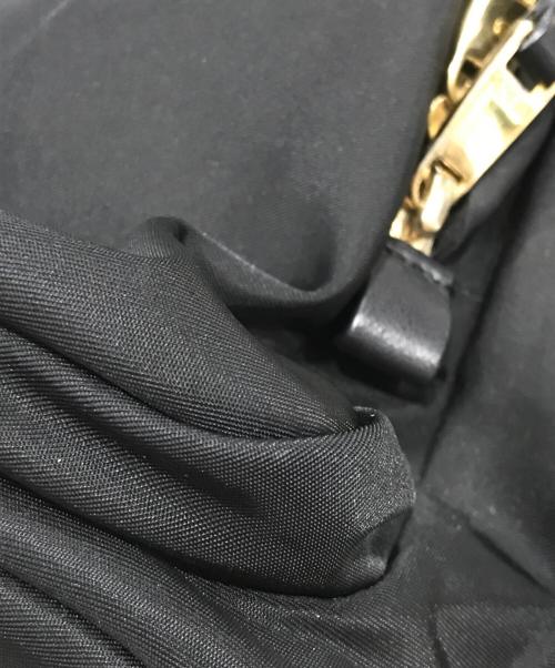 TUMI（トゥミ）TUMI (トゥミ) リュック ブラック×ゴールドの古着・服飾アイテム