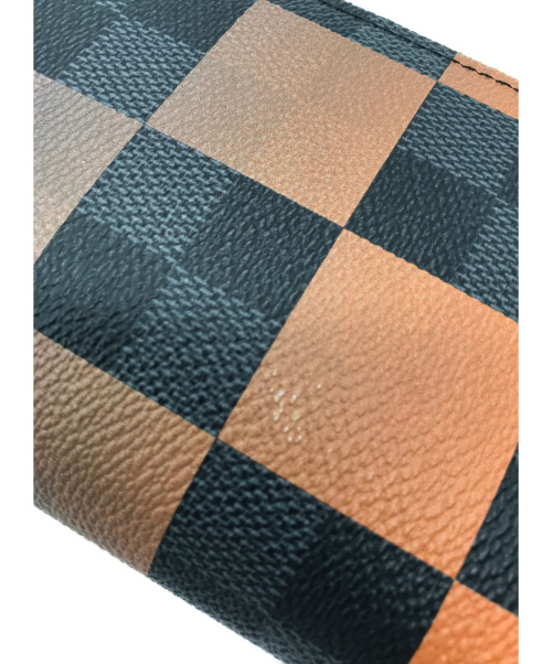 LOUIS VUITTON（ルイ ヴィトン）LOUIS VUITTON (ルイ ヴィトン) ポルトフォイユ・ブラザNM ボルケーノオレンジ 20年製　ダミエ・グラフィット・ジャイアント TA4230の古着・服飾アイテム