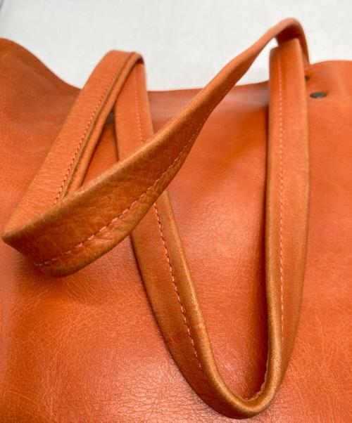 TUSTING（タスティング）TUSTING (タスティング) トートバッグ オレンジの古着・服飾アイテム