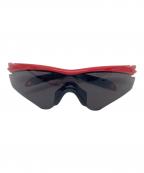 OAKLEYオークリー）の古着「サングラス」｜レッド