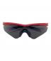 OAKLEY（オークリー）の古着「サングラス」｜レッド