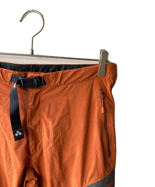 mont-bell（モンベル）mont-bell (モンベル) コンバーチブル 1／2パンツ オレンジ サイズ:M-Sの古着・服飾アイテム