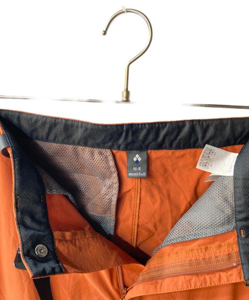 mont-bell（モンベル）mont-bell (モンベル) コンバーチブル 1／2パンツ オレンジ サイズ:M-Sの古着・服飾アイテム