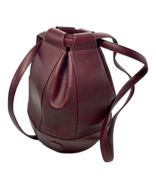must de cartier（マストドゥカルティエ）must de cartier (マストドゥカルティエ) バッグ ボルドーの古着・服飾アイテム