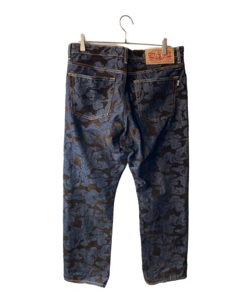 A BATHING APE（ア ベイシング エイプ）A BATHING APE (ア ベイシング エイプ) CAMO FLOCKED RELAXED FIT 13 OZ DENIM PANTS インディゴ サイズ:Lの古着・服飾アイテム