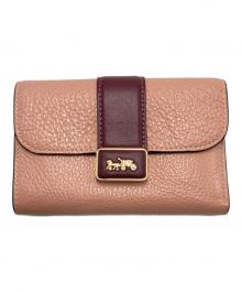 COACH（コーチ）の古着「ミディアム グレース ウォレット」｜ピンク