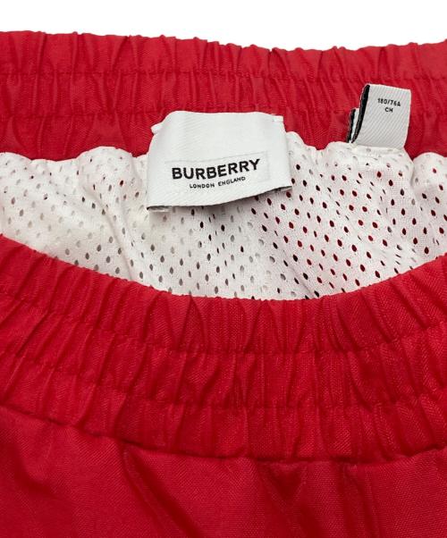BURBERRY（バーバリー）BURBERRY (バーバリー) Logo Graphic Striped Nylon Trackpants レッド サイズ:Sの古着・服飾アイテム