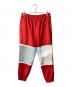 BURBERRY（バーバリー）の古着「Logo Graphic Striped Nylon Trackpants」｜レッド